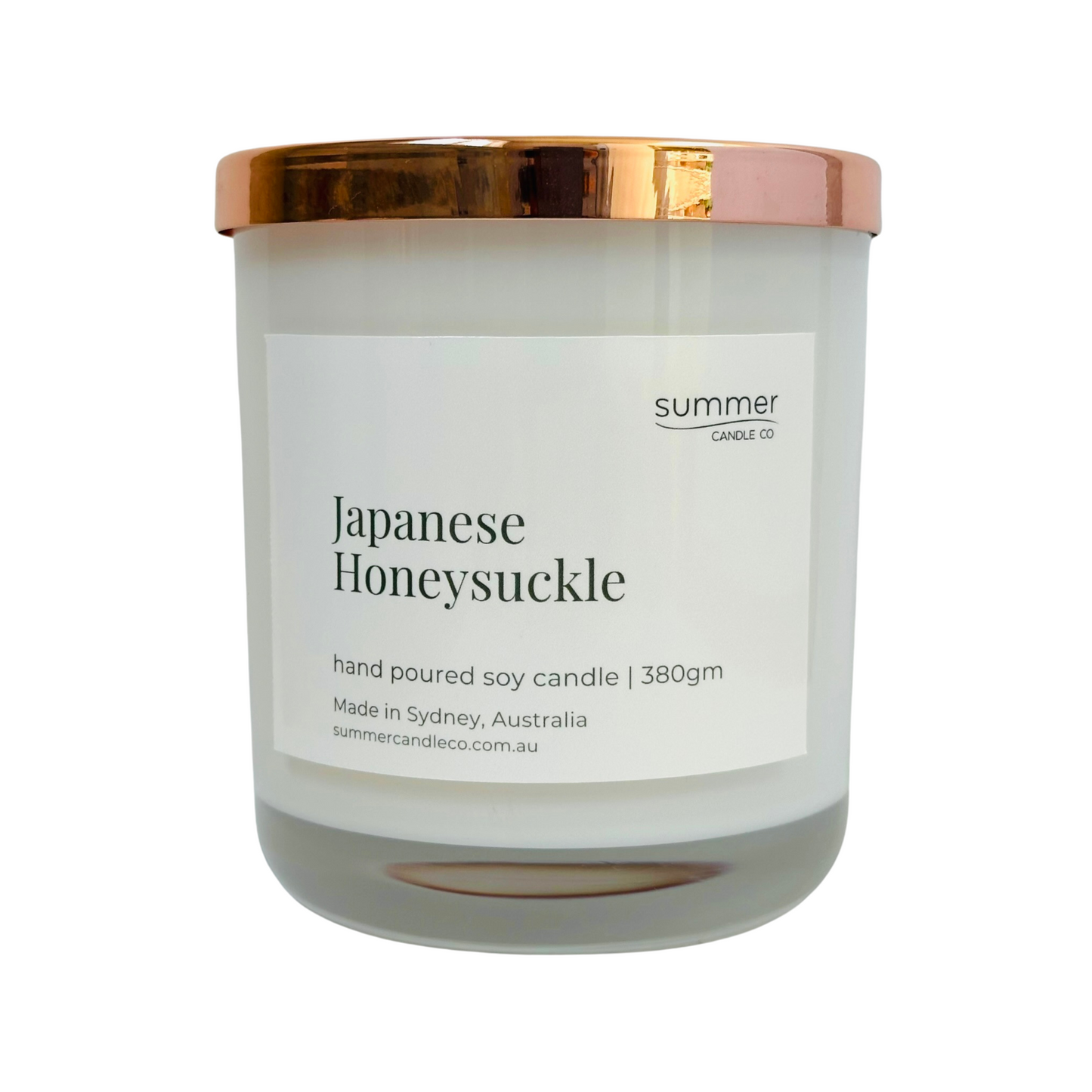 Lovely Hand Poured Soy Candle 380gram Fragrance of Japanese Honeysuckle. Hand-poured soy wax candle in a white jar with a rose gold lid, scented with Japanese Honeysuckle. A sweet floral aroma with notes of jasmine and honey. Clean-burning and perfect for gifting or creating a calming, elegant atmosphere.