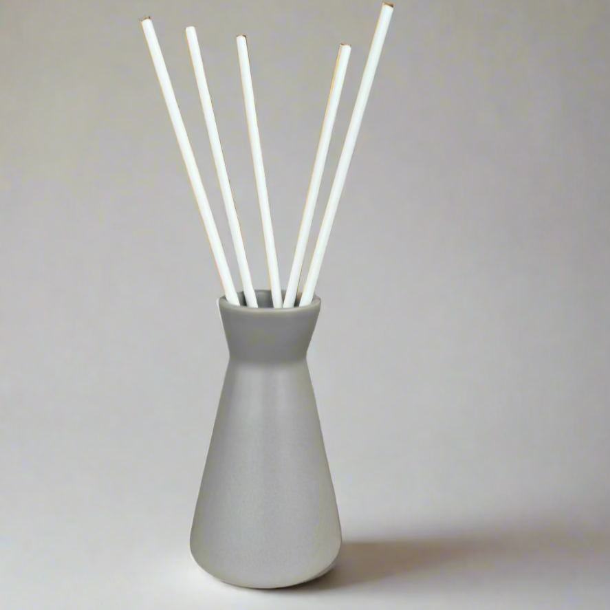 Taupe coloured ceramic reed diffuser, with 150 mls of fragrance of your choice