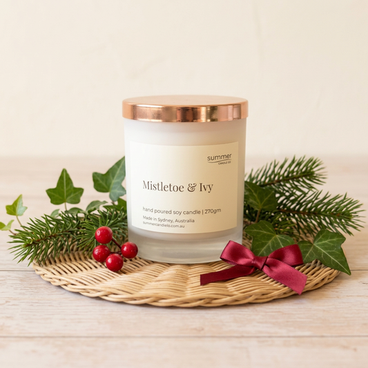 Mistletoe & Ivy candle with evergreen, ivy, red berries and ribbon
